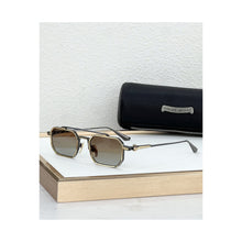 Óculos de Sol Chrome Hearts Rump - variante dourada e preta com lente marrom