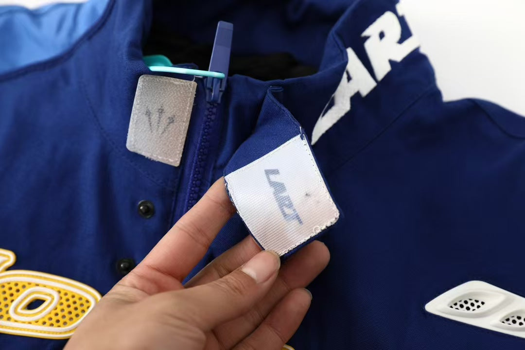 Jaqueta L'art x NOCTA x Nike Racing